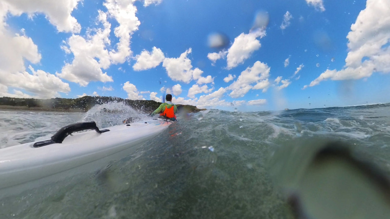 Kayak through the surf